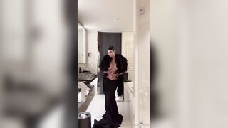 Mia Khalifa Trying on a Sexy Outfit with Her Breasts Exposed