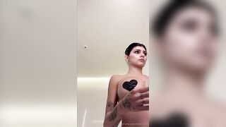 Mia Khalifa Trying on a Sexy Outfit with Her Breasts Exposed