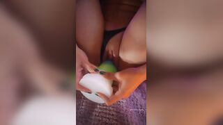 Brenda Trindade masturbating with a colorful dildo