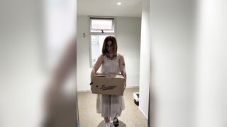Homemade porn video of a redhead dressed as a package delivery woman fucking a strang